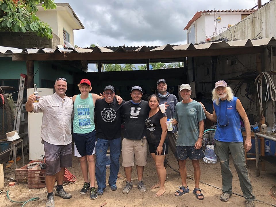Post tropical storm Hernán cleaning crew